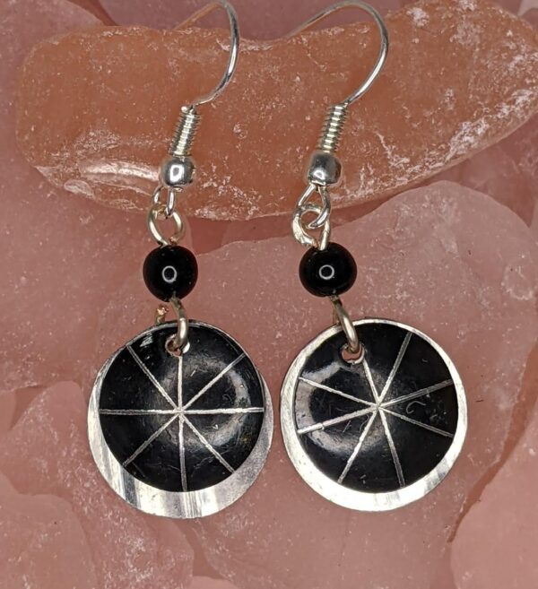 black wheel disc earrings